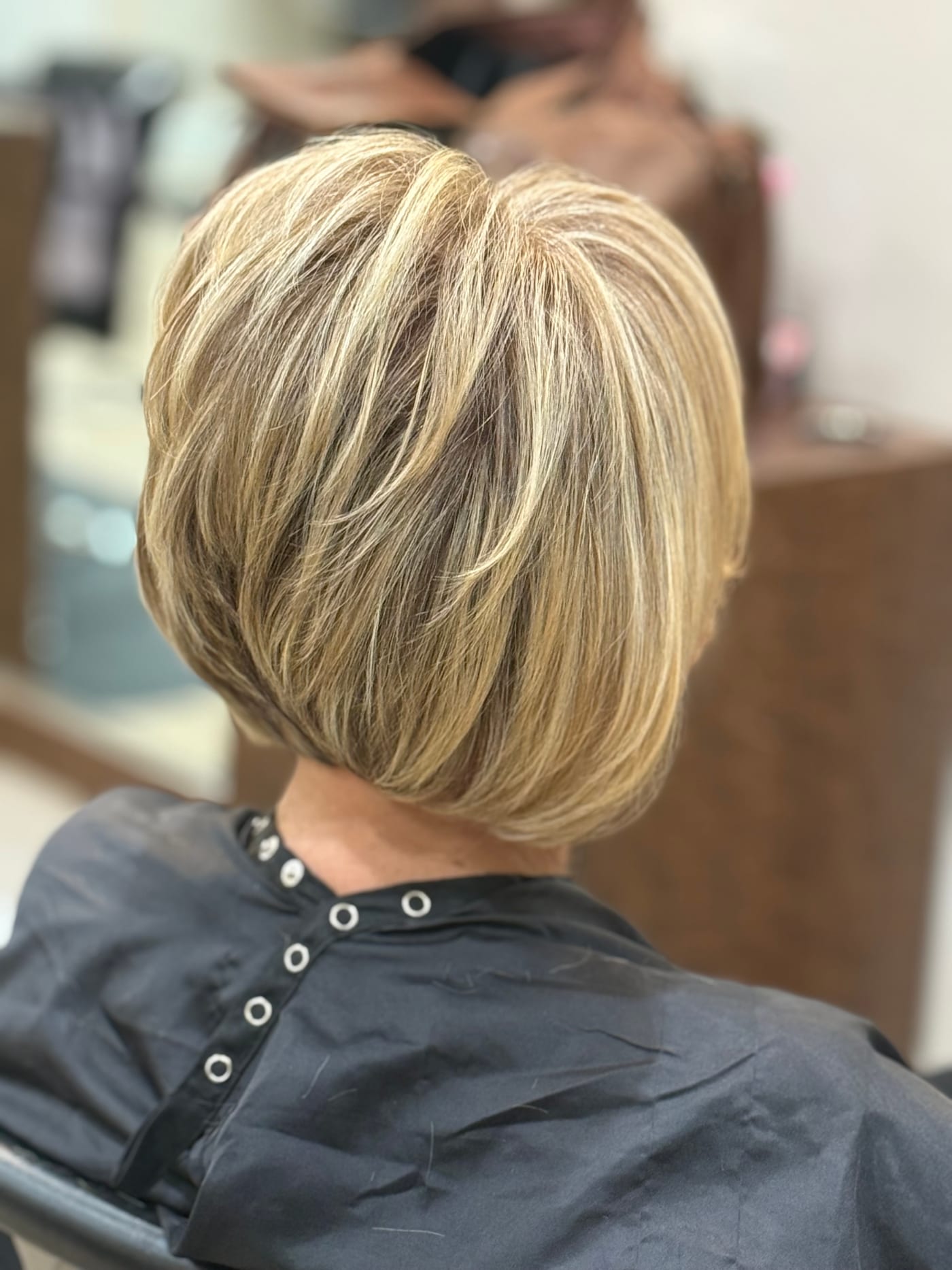 Glam bob hair cut , glam highlights